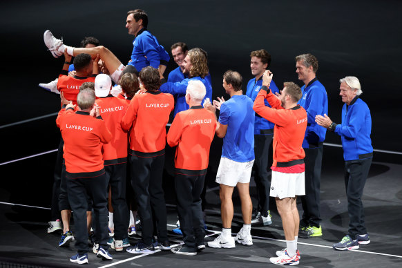 Roger Federer is celebrated by Team World and Team Europe at the Laver Cup in London.