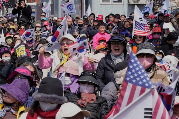 Thousands of Yoon supporters cried and chanted slogans when they saw the news.