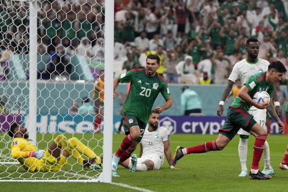 Henry Martin opens the scoring for Mexico.