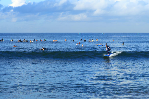 Catch your first wave at Batu Balong Beach.