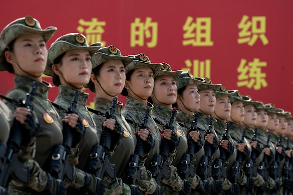 Female soldiers practise for the military parade in Beijing.