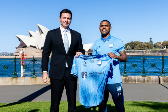 Douglas Costa with Sydney FC chairman Scott Barlow.