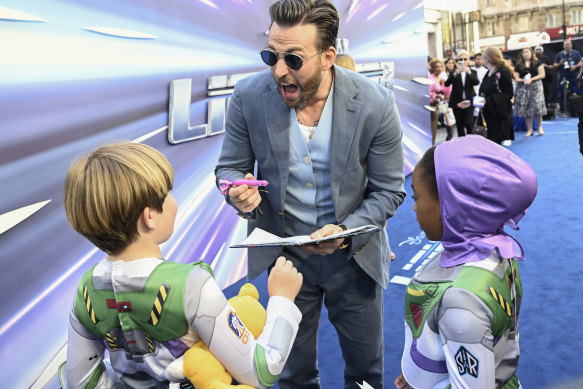 Chris Evans is interviewed by young fans at the UK Premiere of Lightyear.