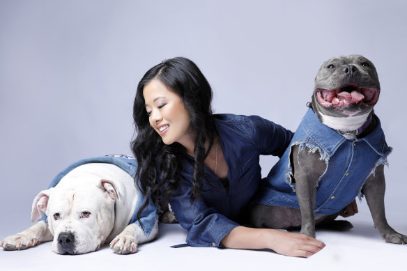 Monica Keo, pictured with Bronx and Denver, founded Pooch Cakes to cater to her dogs’ allergies.