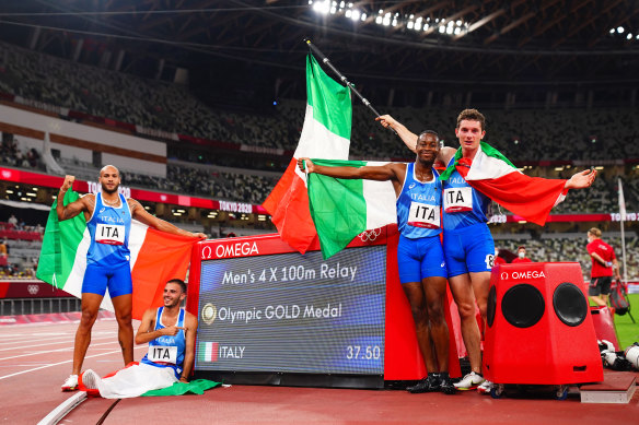 From left: Lamont Marcell Jacobs, Lorenzo Patta, Eseosa Desalu and Filippo Tortu celebrate Italy’s 4x100 relay win gold.