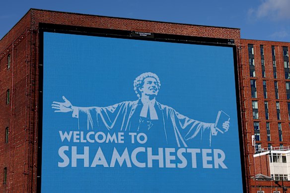 A billboard in Manchester after City had been found guilty of all charges.