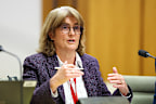 RBA governor Michele Bullock talks to the standing committee on economics in Canberra on Friday.