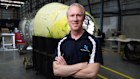 Adam Gilmour, CEO of Gilmour Space, is photographed next to the test vehicle they intend of launching this year at the company’s facility on the Gold Coast.