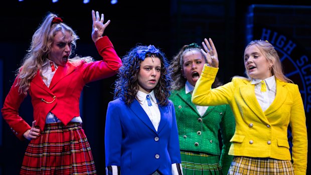 Veronica Sawyer (Emma Caporaso, in blue), ingratiates herself with the “Heathers” (Calista Nelmes, Amlia Rojas and Abigail Sharp).