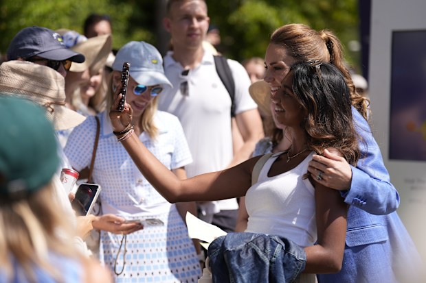 Catherine, Princess of Wales, poses for a selfie with tennis fans during day four of the 2026 Wimbledon Tennis Championships at All England Lawn Tennis and Croquet Club on July 2, 2026 in London, England. 