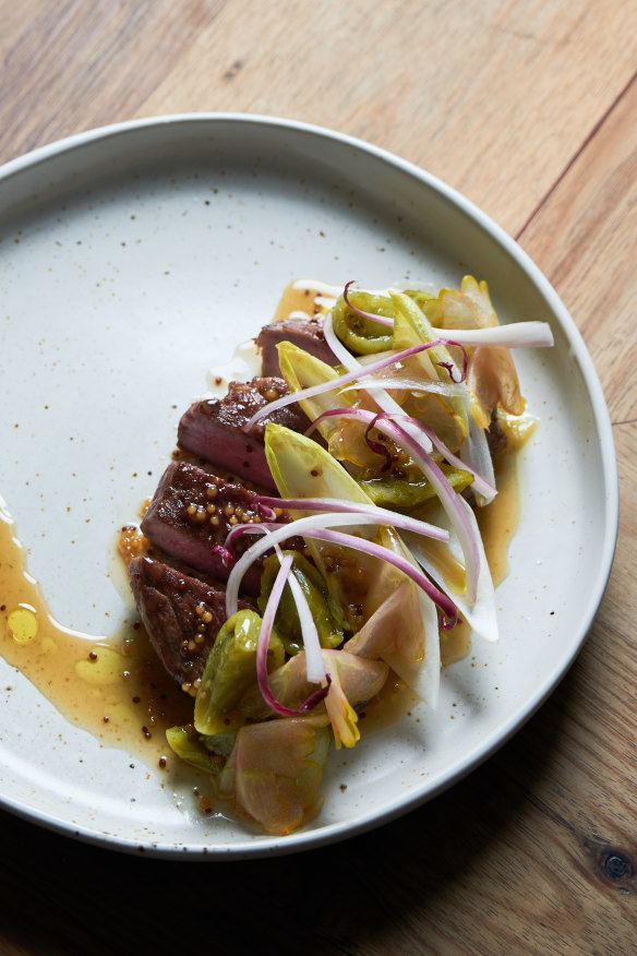 Pork neck, with green tomato mostarda.