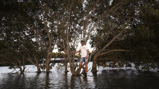 Paul Gallanos who kayaks every morning on Cooks River is concerned that rising water levels is causing the disappearance of an island. 30 August 2024 Photo: Janie Barrett