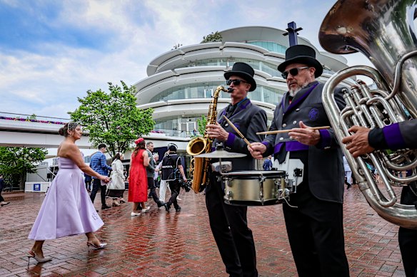 First racegoers arrive at Flemington for this year’s Cox Plate.