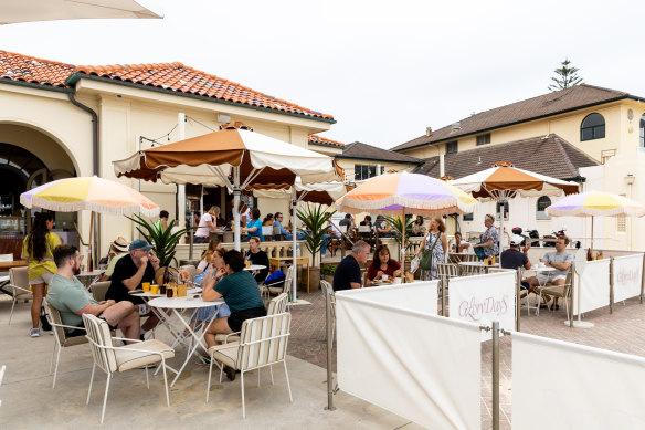 Coloured sun umbrellas on Glory Days’ beachside patio.