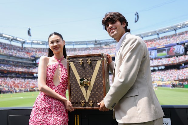 Carlos Alcaraz and Hoyeon present the Louis Vuitton trophy trunk containing the FIFA World Cup Winner’s Trophy before the FIFA World Cup 2026 Final match between Spain and Argentina at New York New Jersey Stadium on July 19, 2026