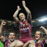 Fitting: Darren Lockyer is carried from the ground after his final Origin match.