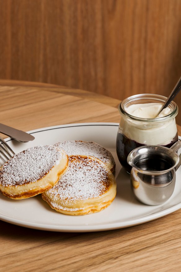Ricotta pancakes with mascarpone and blueberry compote.