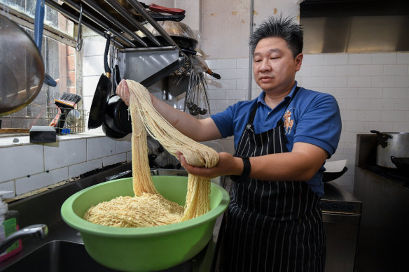PBK Noodles owner Michael Samsir makes Indonesian-style noodles by hand.