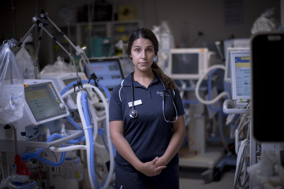 Emma Schroder works in the intensive care unit at the Austin Hospital and had to return to work earlier than planned after having her child after her partner lost work due to the coronavirus lockdown.