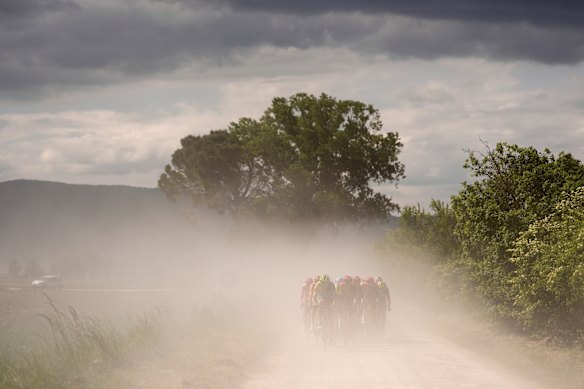 Cyclists ride through the dust along the Tuscan countryside during the sixth stage of the of the Giro d’Italia, Tour of Italy cycling race from Viareggio to Rapolano Terme.