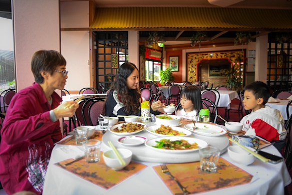 The Cao family from China enjoying a meal at the Golden Crown.