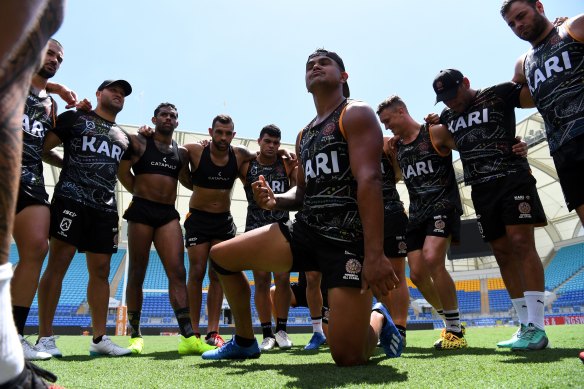 Latrell Mitchell and his Indigenous All Stars teammates practise the war cry they will perform before the All Stars clash on Saturday night.