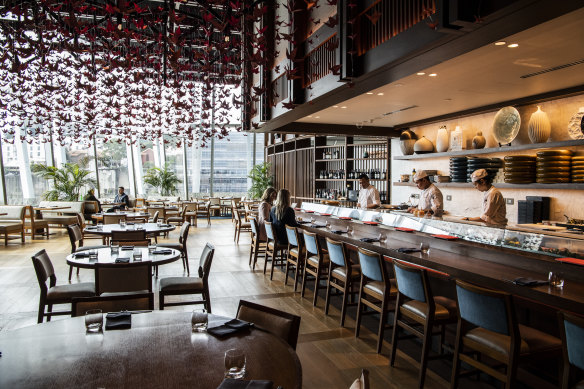 A second dining room is hung with origami cranes that sway to the sound of cocktails being shaken in the bar.