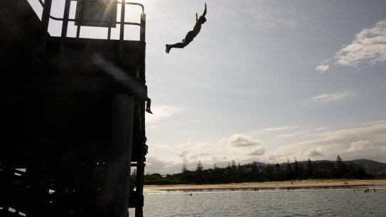 Teenagers jump of the Coffs Harbour jetty in February.