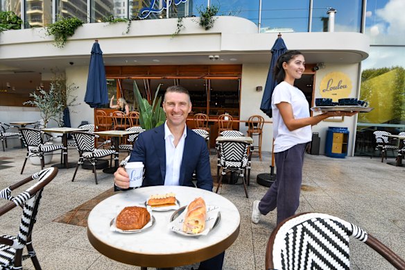 Adam Petta, the CEO of Etymon Projects, at the newly transformed Cafe Loulou. 