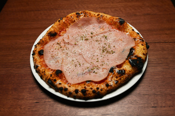 Classic cheese with mortadella pizza at Capitano.