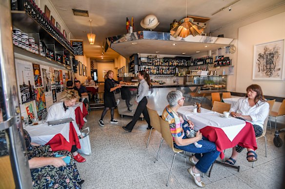 The cafe (shown here in 2021) shifts in mood depending on the time of day.
