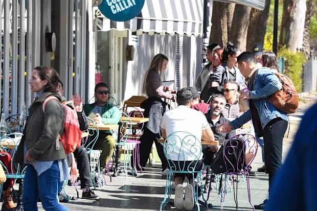 Waiters tending tables customers Surry Hills staff shortages.
