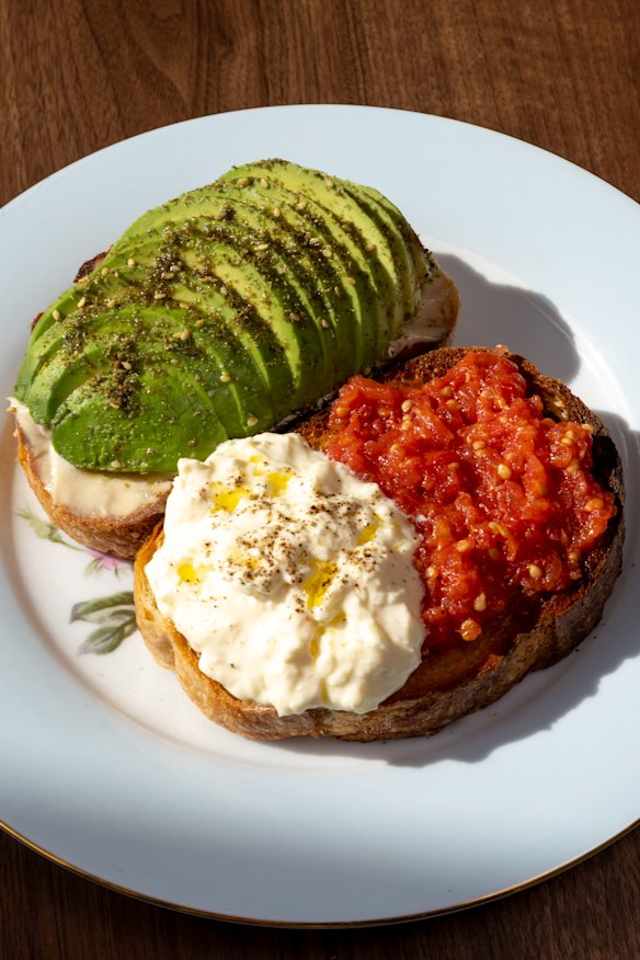 Avocado (and tahini) on toast comes with an extra slice topped with tomato pulp and stracciatella cheese.