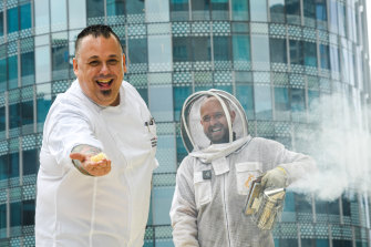 Chef John Giovanni Pugliano and beekeeper Andrew Wilson on the rooftop of the Swissotel where beehives are kept.