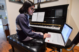 Music lessons are still possible with video conferencing technology. 