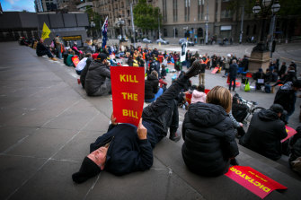 Protesters on the steps of State Parliament on Monday evening.