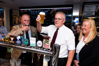 Morrison visited  Cazalys Palmerston Club on Anzac Day where he pulled beers for locals and played a game of two up.