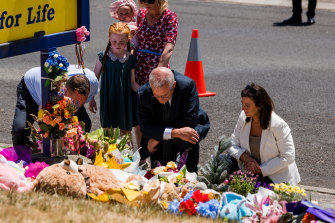 Prime Minister Scott Morrison and his wife a Jenny Morrison pay their respects to the students killed in the tragedy.
