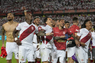 Peru celebrate after booking a spot in the play-off with a 2-0 win over Paraguay in March.