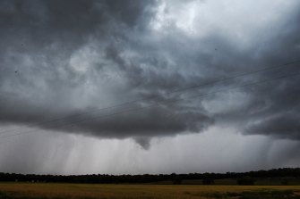 A funnel cloud, a tornado which doesn’t touch down, winding up under a violent thunderstorm east of Mudgee today.