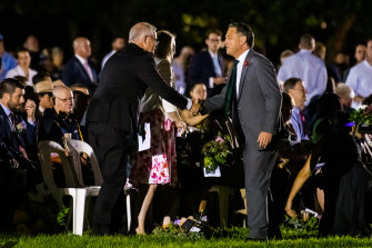 Prime Minister Scott Morrison and deputy Labor leader Richard Marles shake hands at this morning’s Anzac Day dawn service in the NT.