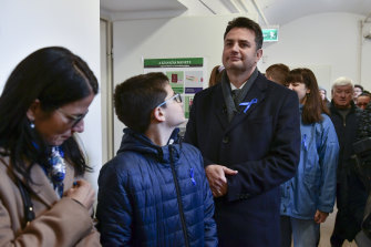 Opposition leader Peter Marki-Zay and members of his family wait to vote in general election in Hodmezovasarhely, southern Hungary, on Sunday. He is the presidential candidate from a coalition of all opposition parties.