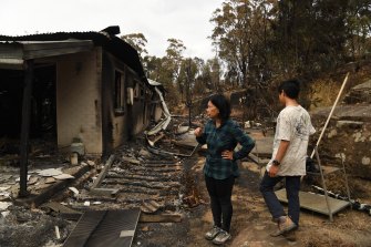 Helena Kam and her son Gabriel at their Balmoral home destroyed by the Green Wattle Creek fire in December 2019.