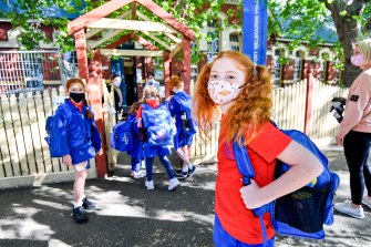 Primary school children mask up in October. 