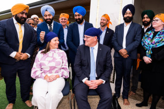Scott Morrison and Jenny Morrison visit Sikh Gurdwara Perth, in the seat of Hasluck, on Friday. 