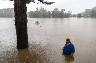 Justin Rose, from Caradon Leisure Park, gets a close look at the flooding.