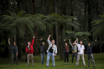 Steve Meacher (centre) and other Friends of the Leadbeater's Possum celebrate their success.