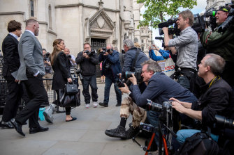 The media pack outside Court 13, where the biggest tabloid feud in Britain is laid bare. 