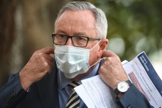 Health Minister Brad Hazzard wore a mask on Tuesday.