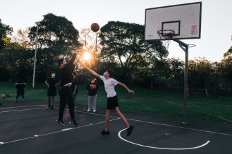 People playing basketball in Tasker Park in Canterbury.